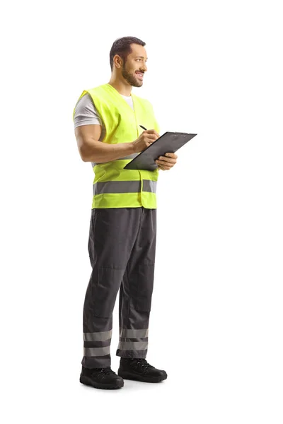 Full Length Shot Worker Reflective Vest Writing Document Smiling Isolated — Stock Photo, Image