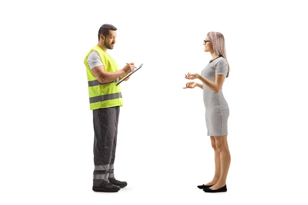 Young Woman Talking Road Assistance Agent Reflective Vest Isolated White — Stock Photo, Image