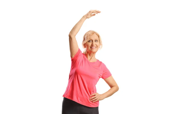 Gammal Kvinna Stretching Arm Isolerad Vit Bakgrund — Stockfoto