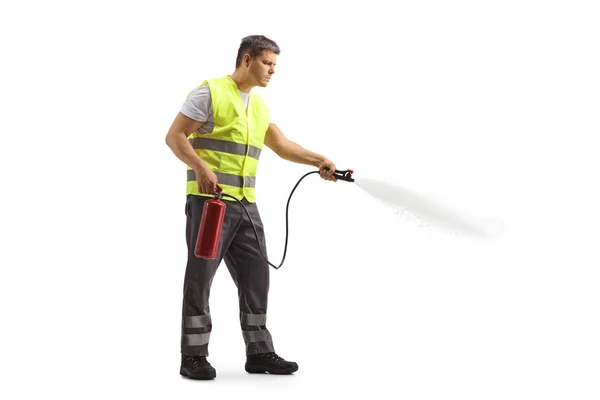 Homem Com Colete Segurança Reflexivo Usando Extintor Isolado Fundo Branco — Fotografia de Stock
