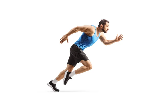 一名健康男子运动员在白色背景下跑得很快的全长特写镜头 — 图库照片