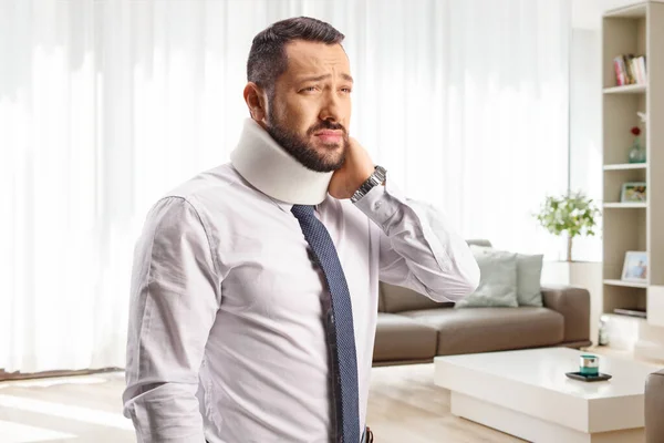 Injured Man Pain Cervical Collar Holding His Neck Home Living — Stock Photo, Image