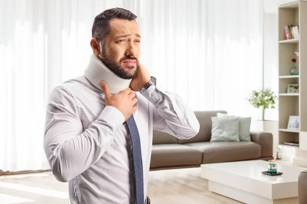 Injured Man Pain Neck Collar Holding His Neck Home Living — Stock Photo, Image