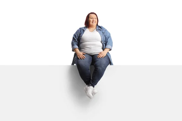 Young Overweight Woman Sitting Blank Panel Isolated White Backgroun — Stock Photo, Image