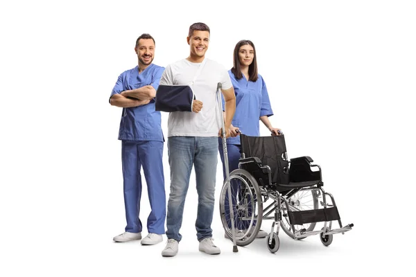 Young Man Arm Leg Injury Standing Male Female Health Care — Stock Photo, Image