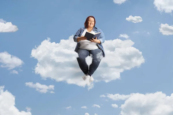 Overweight Young Woman Sitting Cloud Reading Book — Stock Photo, Image