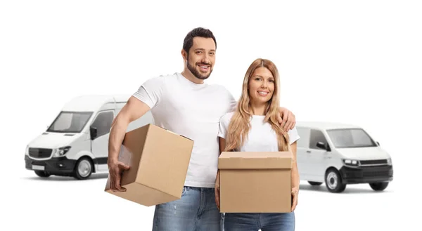 Young Couple Holding Cardboard Boxes Standing Front Transport Vans Isolated — Stock Photo, Image