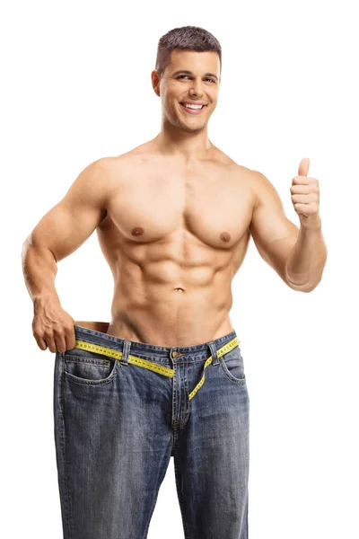 Shirtless Muscular Man Wearing Big Size Jeans Weight Loss Gesturing — Stock Photo, Image
