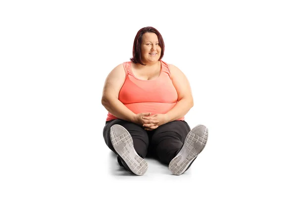 Übergewichtige Junge Frau Sportbekleidung Sitzt Isoliert Auf Weißem Hintergrund Auf — Stockfoto