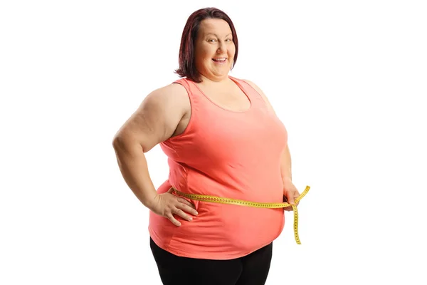 Übergewichtige Frau Misst Ihre Taille Mit Klebeband Und Lächelt Isoliert — Stockfoto