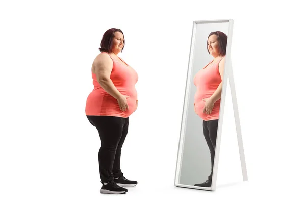 Mulher Com Excesso Peso Segurando Barriga Frente Espelho Isolado Fundo — Fotografia de Stock