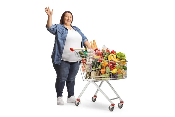 Full Length Shot Overweight Woman Standing Full Shopping Cart Waving — Stock Photo, Image