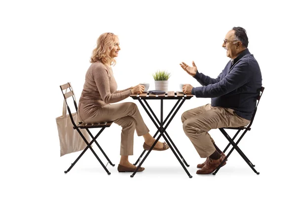 Mature Couple Sitting Table Talking Having Cup Coffee Isolated White — Stock Photo, Image