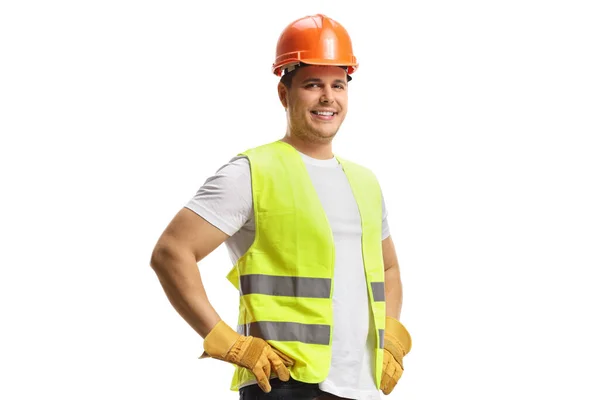 建筑工人戴着安全帽 穿着安全背心 对着白色背景的相机微笑 — 图库照片