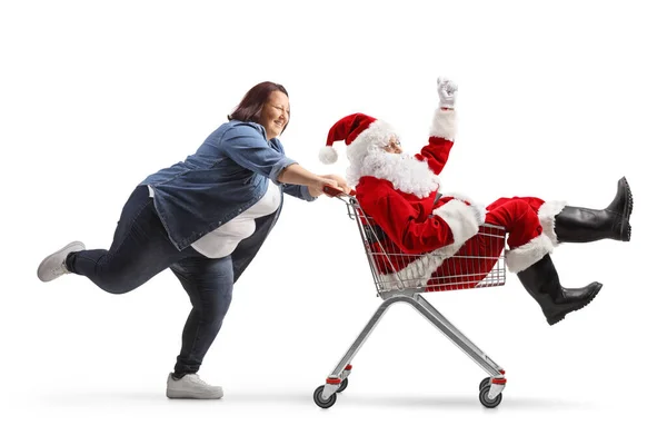 Vollständige Profilaufnahme Einer Frau Die Weihnachtsmann Einen Einkaufswagen Schiebt Isoliert — Stockfoto