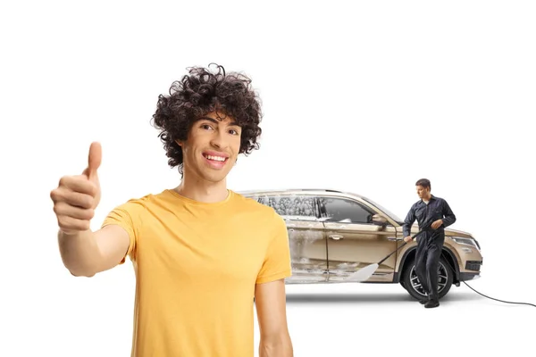 Happy Young Man Suv Gesturing Thumb Sign Carwash Isolated White — Stock Photo, Image