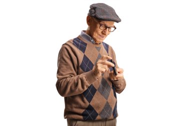 Elderly man poking finger with an insulin pen isolated on white background