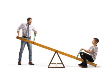Father playing on a seesaw with a boy isolated on white background