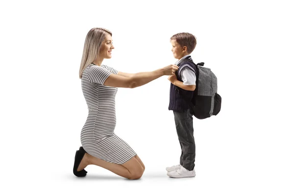 Full Length Profile Shot Mother Helping Son Getting Ready School — стокове фото
