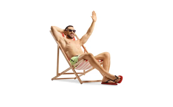 Guy Swimwear Enjoying Beach Chair Waving Isolated White Backgroun — Stock Photo, Image