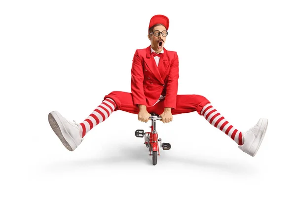Смешной Человек Красном Костюме Маленьком Красном Велосипеде Белом Фоне — стоковое фото