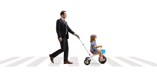 Full Length Profile Shot Father Pushing Girl Tricycle Pedestrian Crossing — Stock Photo, Image