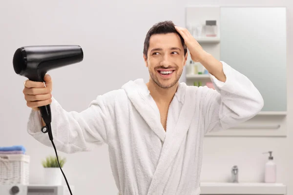Happy Man Bathrobe Drying His Hair Hairdryer Ina Bathroom — Stock Photo, Image