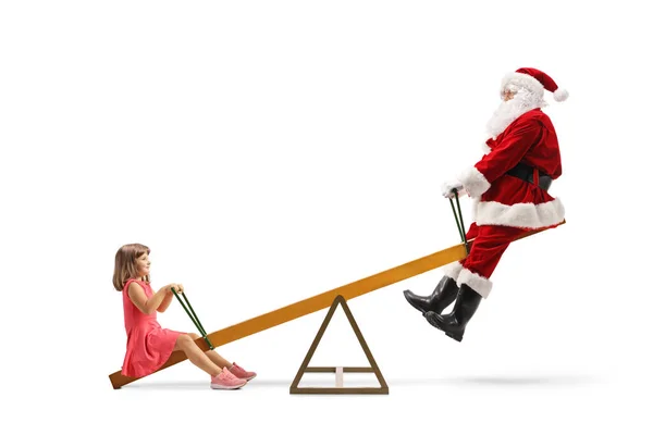 Άγιος Βασίλης Παίζει Ένα Κορίτσι Μια Τραμπάλα Απομονωμένη Λευκό Φόντο — Φωτογραφία Αρχείου