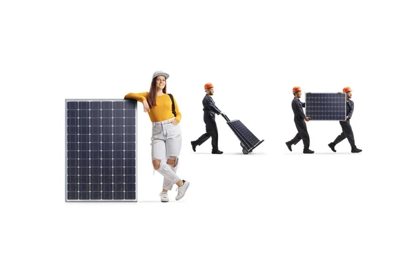 Female student leaning on a panel and factory workers carrying photovoltaic cells isolated on white background