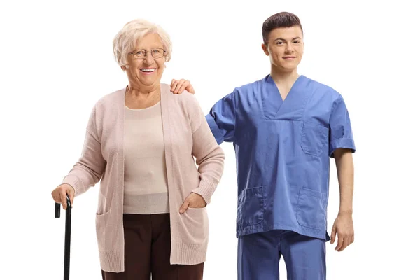 Νοσοκόμος Και Ηλικιωμένη Ασθενής Μπαστούνι Απομονωμένο Λευκό Φόντο — Φωτογραφία Αρχείου