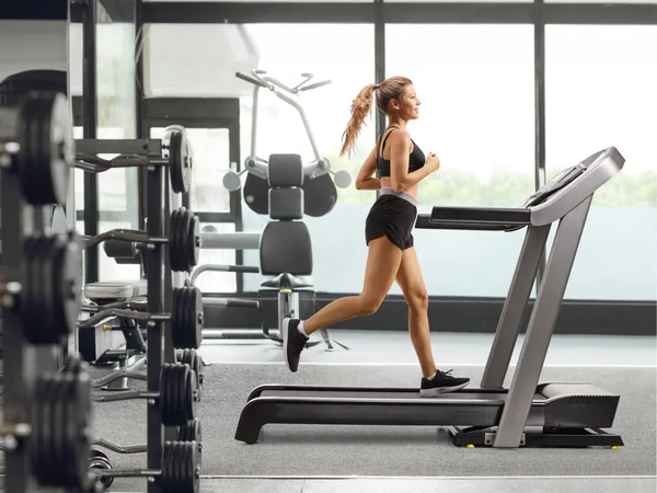 Full Length Profile Shot Young Female Running Treadmill Gym — Stock Photo, Image