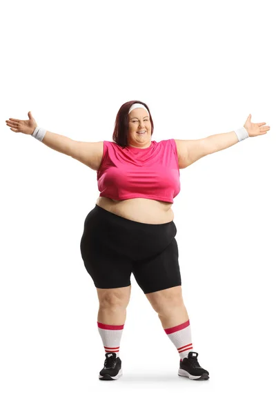 白い背景に孤立した彼女の姿を示すスポーツウェアの幸せな太りすぎの女性 — ストック写真