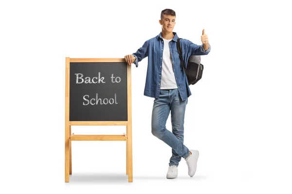 Full Length Portrait Male Teenage Student Backpack Leaning Blackboard Text — Stock Photo, Image