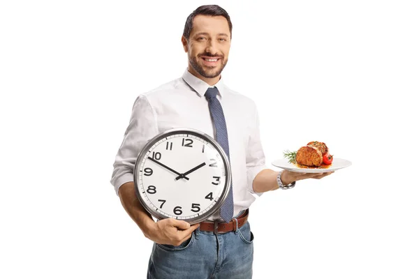 Smiling Man Holding Plate Baked Meat Clock Isolated White Background — Stock Photo, Image
