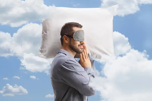Man Pajamas Sleeping Mask Pillow Clouds Sky Background — Stock Photo, Image