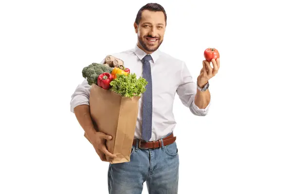 Cheerful Young Man Holding Grocery Bag Tomato Isolated White Background — Stock Photo, Image