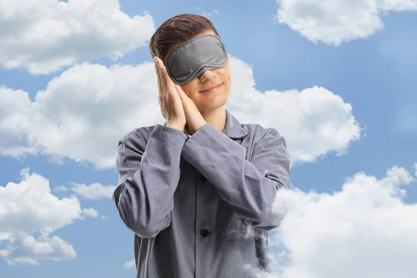 Young Man Pajamas Wearing Sleeping Mask Clouds Sky Background — Stock Photo, Image