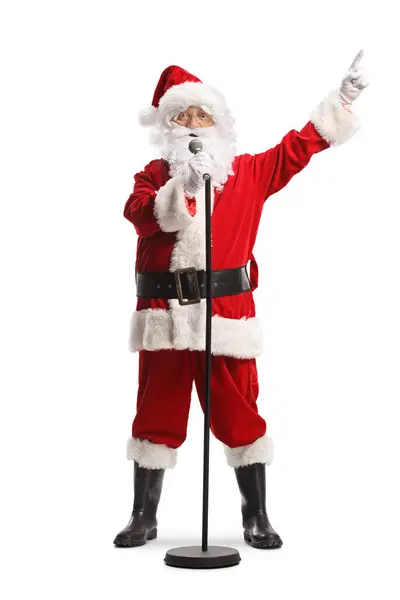 Kerstman Met Een Microfoon Zingen Wijzen Met Vinger Geïsoleerd Witte — Stockfoto