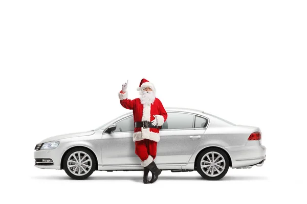 Santa Claus Leaning Silver Car Pointing Isolated White Background — Stock Photo, Image