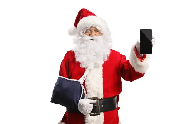 Santa Claus Con Una Lesión Brazo Usando Cabestrillo Sosteniendo Teléfono — Foto de Stock
