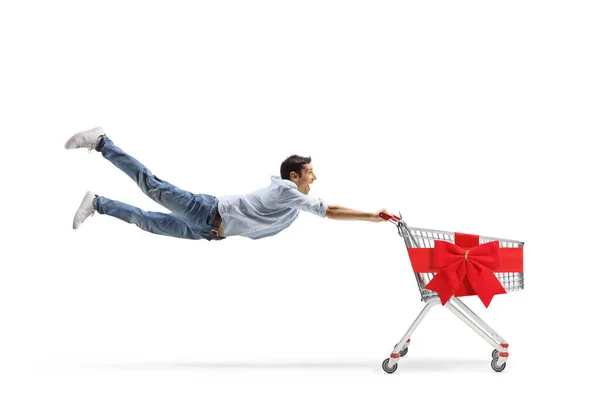 Full Length Shot Casual Young Man Flying Holding Empty Shopping — Stock Photo, Image