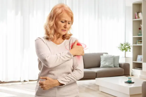 Mature Woman Room Holding Her Shoulder Red Inflamed Spot — Stock Photo, Image