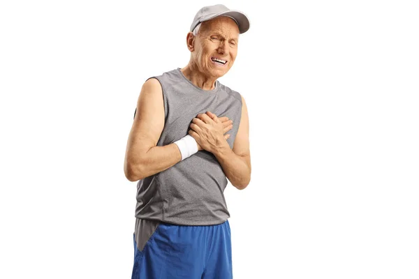 身穿运动服的老年男子心脏病发作 与白人背景隔离 — 图库照片