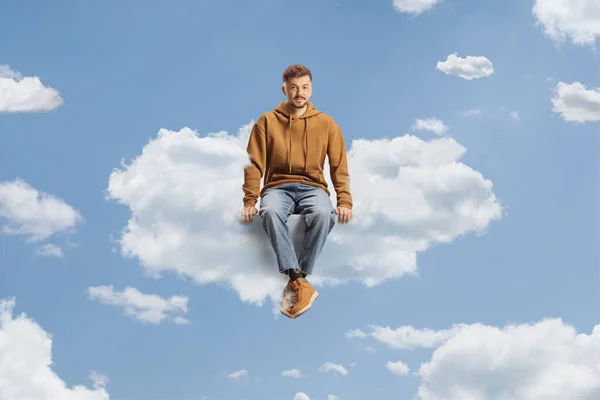 Guy Jeans Hoodie Sitting Cloud Sky — Stock Photo, Image