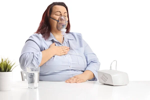 Size Woman Holding Her Chest Using Nebulizer Isolated White Background — Stok fotoğraf