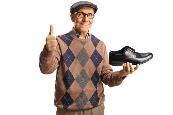 Elderly Man Holding Black Leather Shoe Gesturing Thumbs Isolated White — Stock Photo, Image