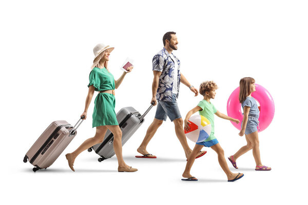 Family going on a summer vacation, packed with suitcases and beach accessories isolated on white background
