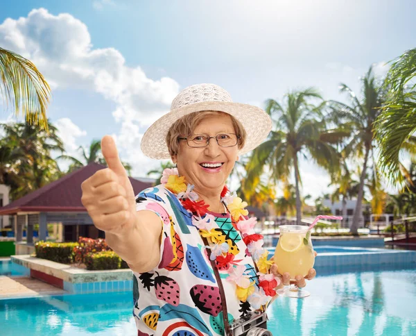 Cheerful Mature Female Tourist Holding Cocktail Making Thumb Sign Swimming — Stock Photo, Image