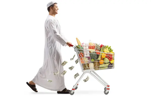 Muslim Man Dishdasha Pushing Shopping Cart Food Money Isolated White — Stock Photo, Image