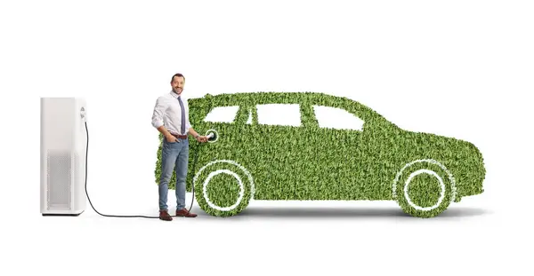 Businessman Charging Green Electric Suv Looking Camera Isolated White Background — Stock Photo, Image